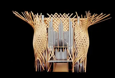 A scale model of an organ constructed in wood with pipes oriented vertically and painted to suggest the appearance of metal. The instrument is surrounded by a dynamic latticework of wood which opens upward toward the ceiling.