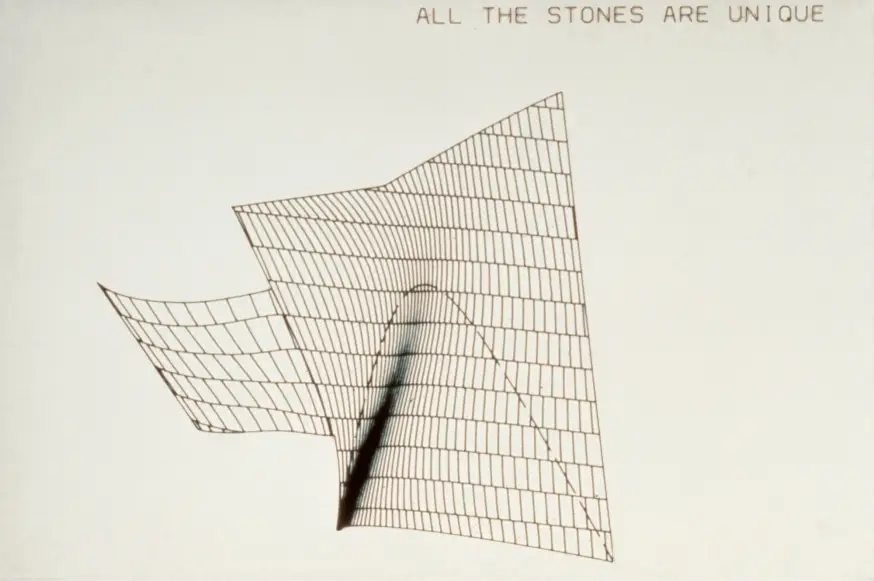 A still from a digital model for the study of cladding for the Walt Disney Concert Hall, with superimposed text reading "All the stones are unique"